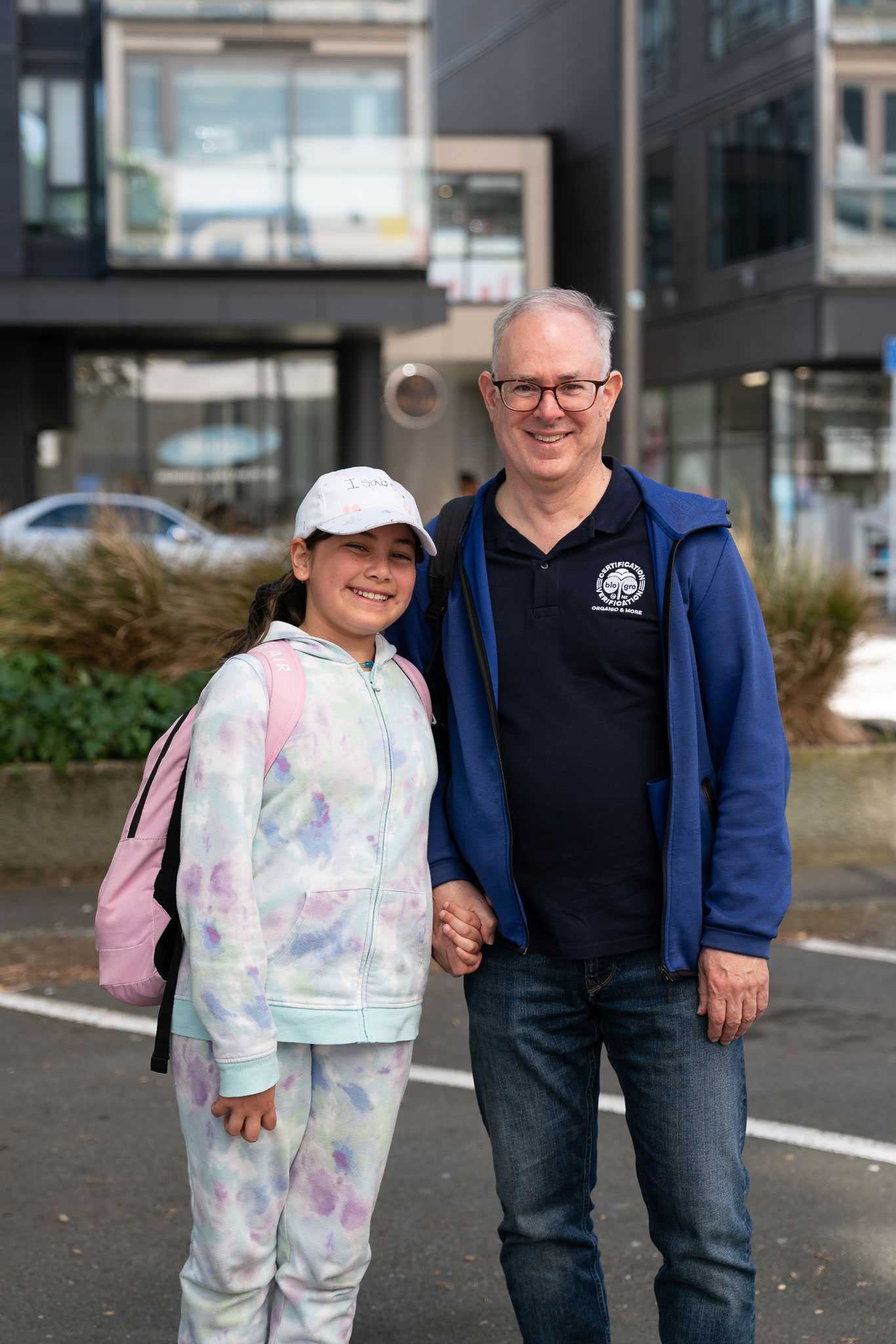 Donald and his daughter standing on the street in Wellington.