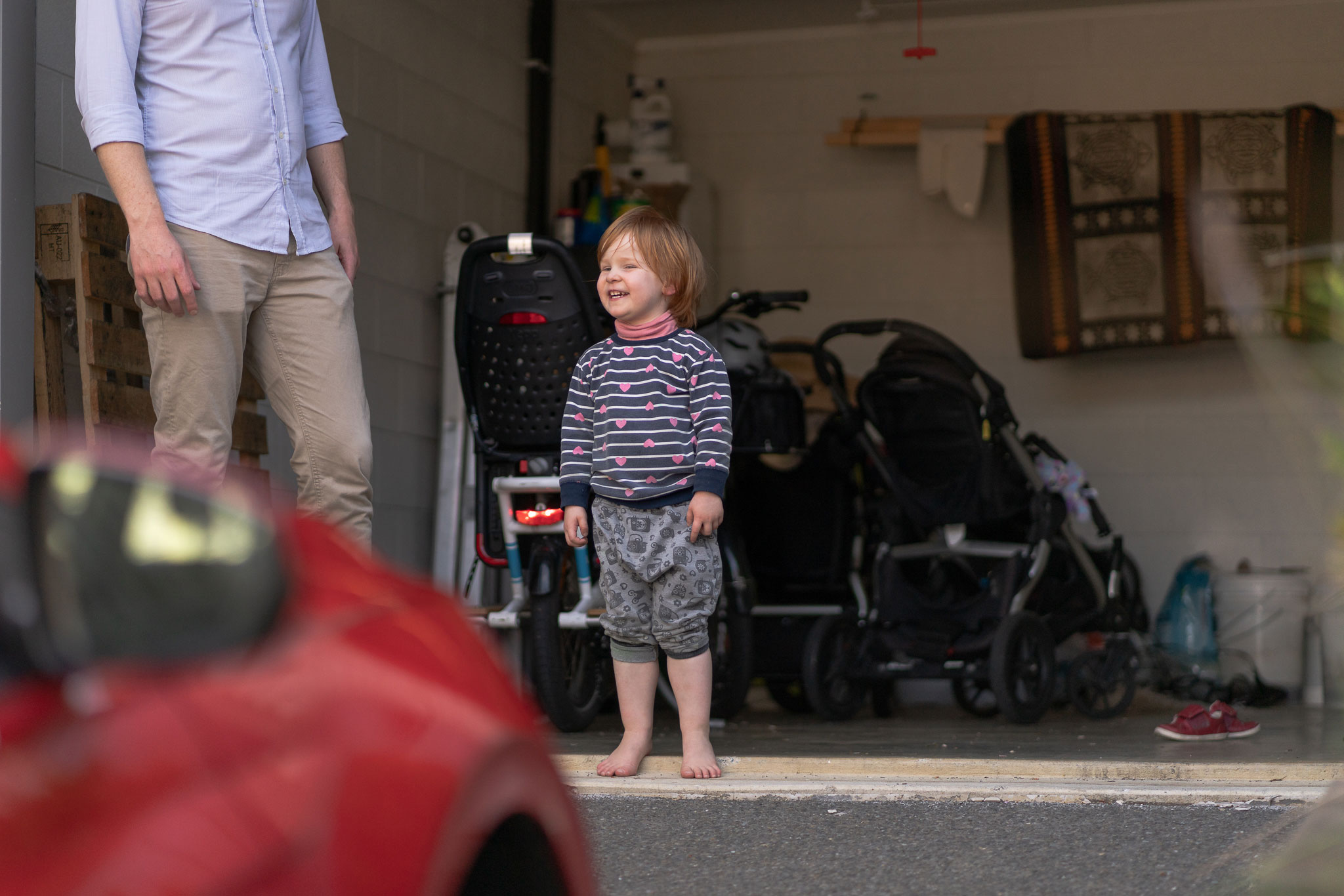 James and his three-year-old in their garage.