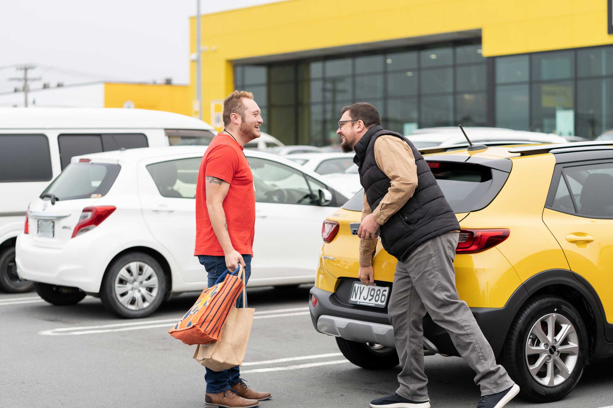 Jason and his partner visiting the supermarket with a Mevo vehicle.